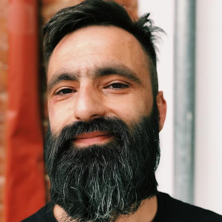 Portrait of Alex Moreno, community mentor and Italian cuisine specialist